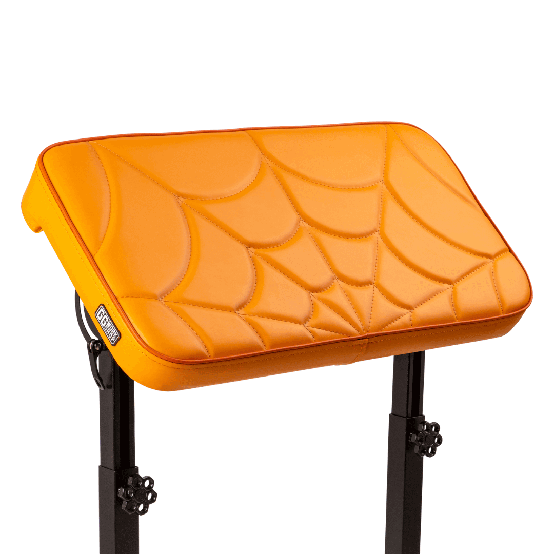 Orange vinyl tattoo pillow with spider web design, ideal tattoo armrest for clients, customized tattoo pillow set, armrest for tattoo.